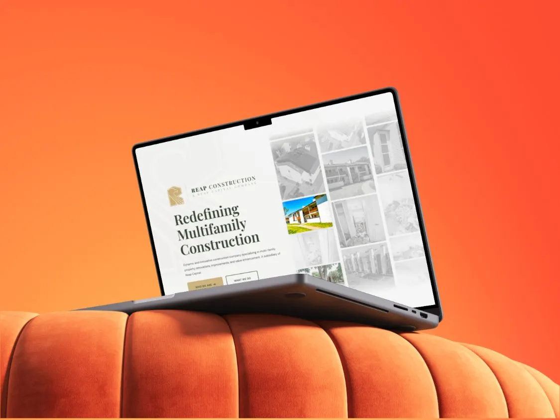 The Reap Construction homepage on a laptop