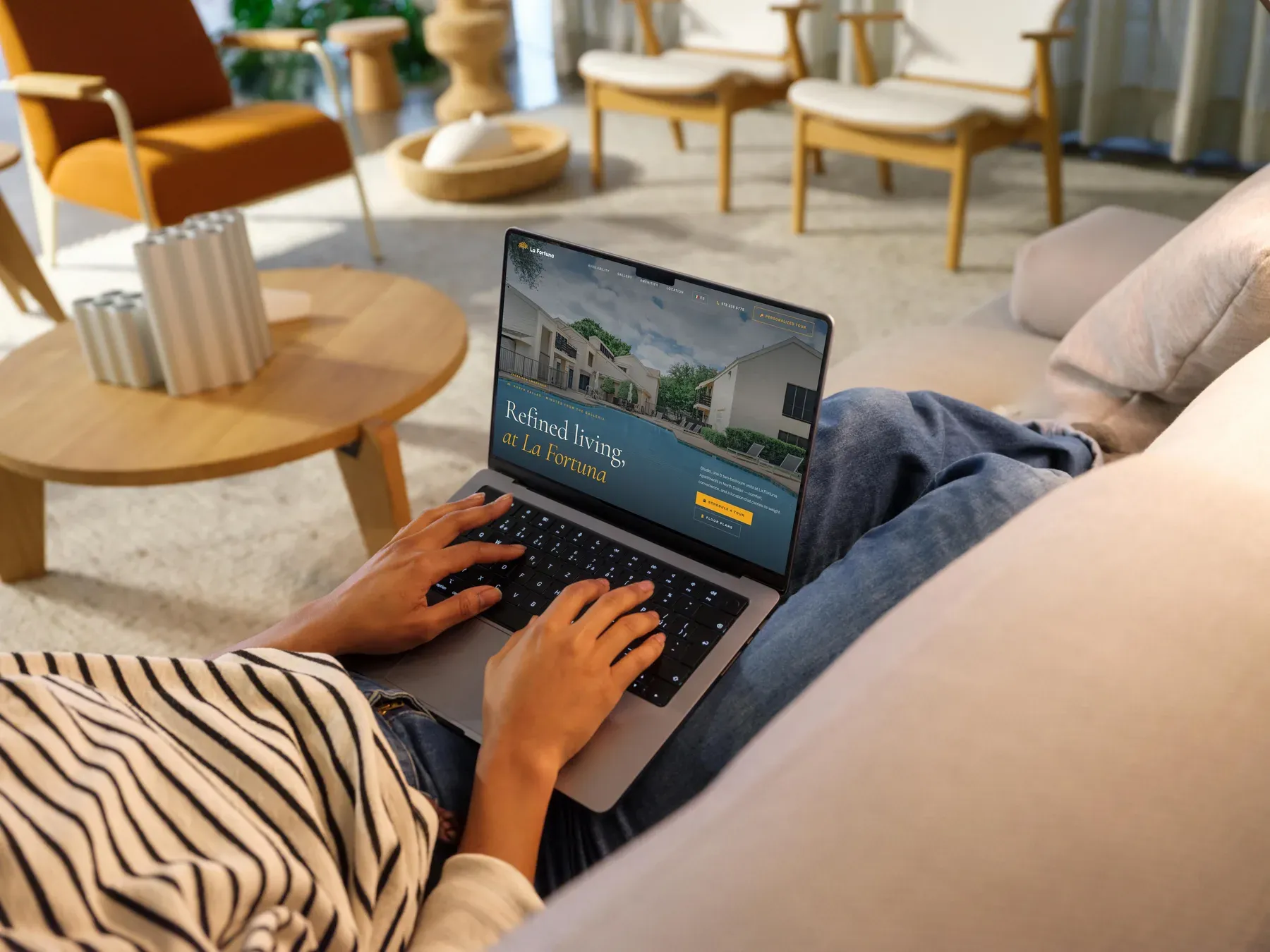 The La Fortuna homepage open on a laptop