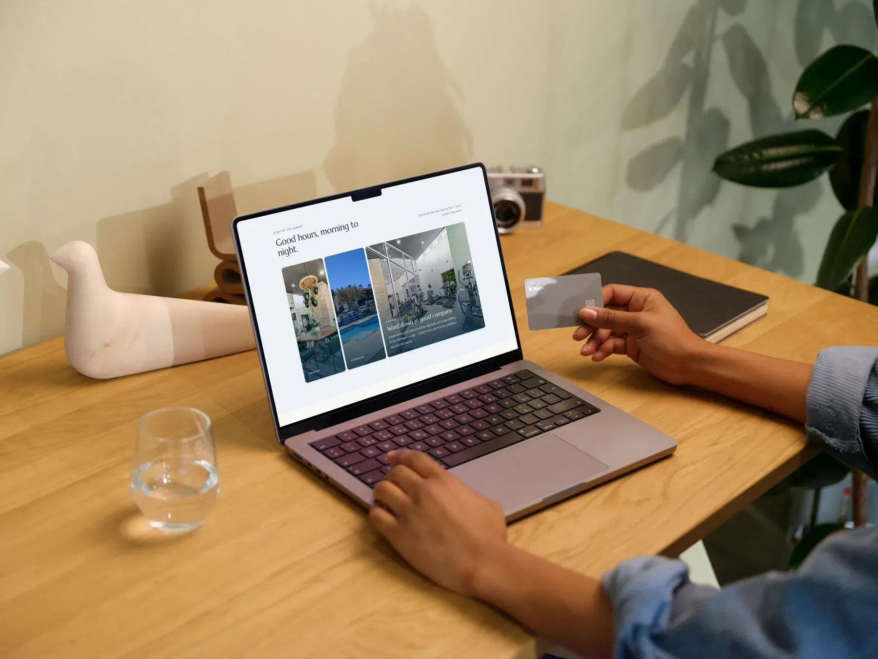 The Landry homepage open on a laptop